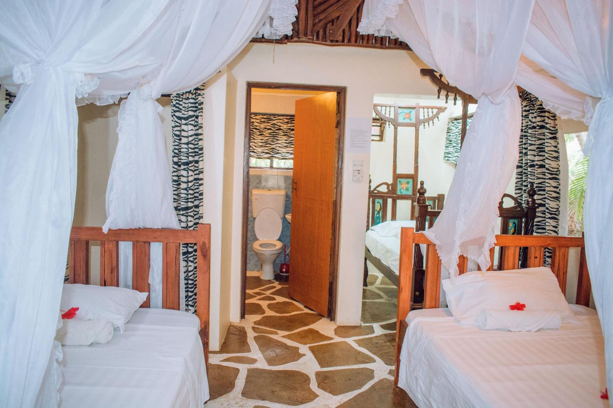 Kijani Cottages In Diani Diani Beach Kültér fotó