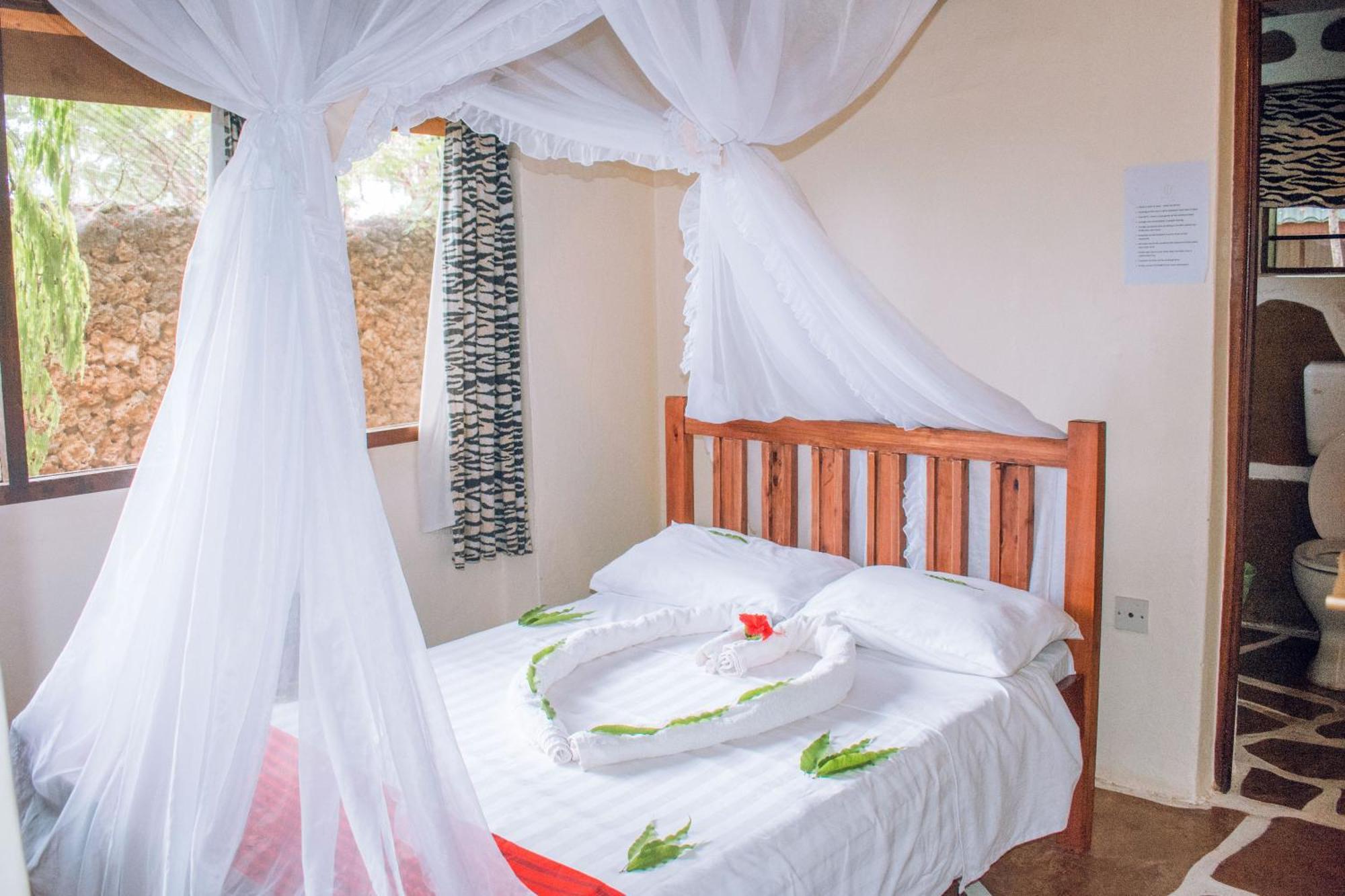 Kijani Cottages In Diani Diani Beach Kültér fotó